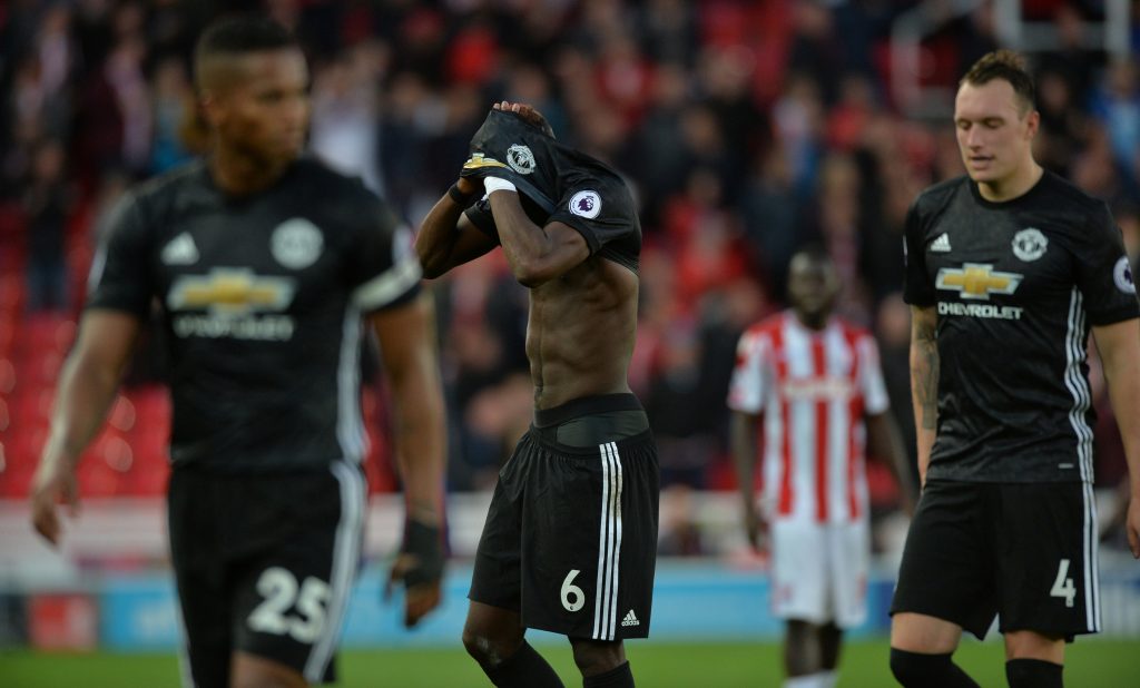 Paul Pogba and Phil Jones look dejected at the end of the match.