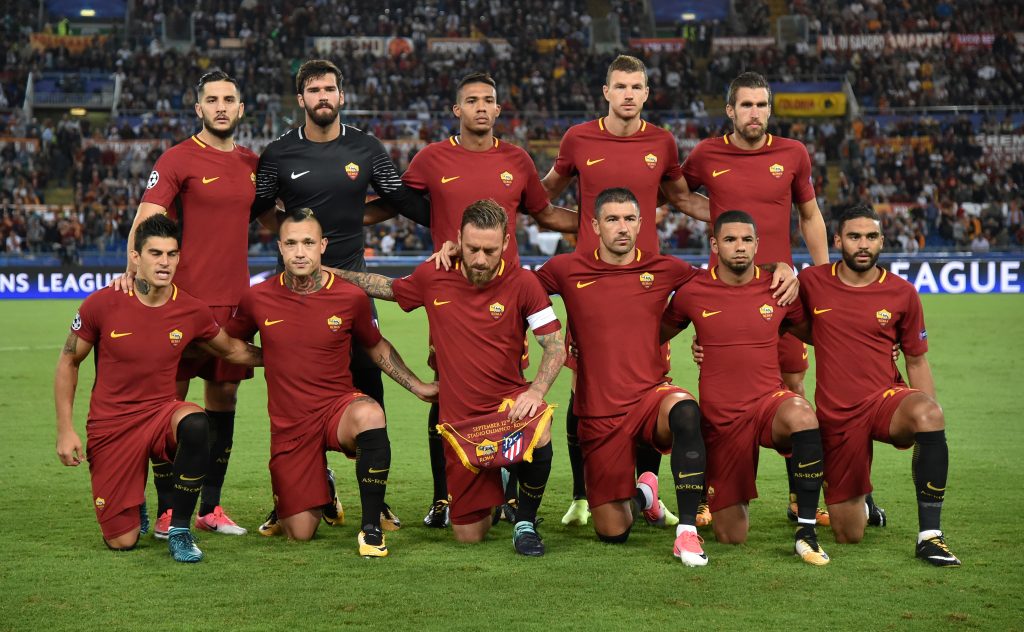 Roma players pose for the pre match photograph.