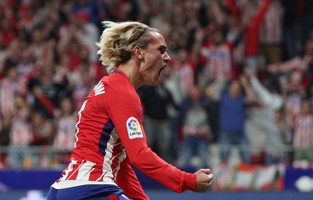 Atletico Madrids Antoine Griezmann celebrates scoring their first goal.