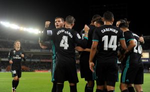 Real Madrids Borja Mayoral celebrates scoring their first goal with team mates.