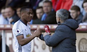 Anthony Martial is congratulated by manager Jose Mourinho after he is substituted.
