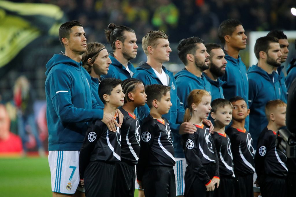Real Madrids Cristiano Ronaldo and team mates line up before the match.