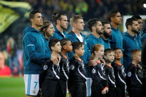 Real Madrids Cristiano Ronaldo and team mates line up before the match.
