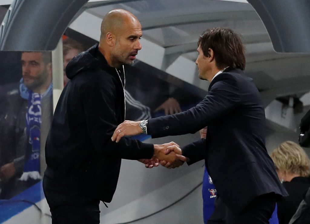 Man City manager Pep Guardiola and Chelsea manager Antonio Conte after the match.