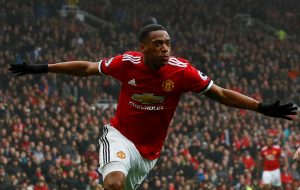 Anthony Martial celebrates scoring.