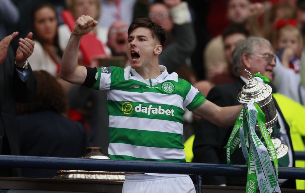 Celtic's Kieran Tierney lifts the trophy.