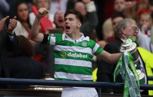 Celtic's Kieran Tierney lifts the trophy.
