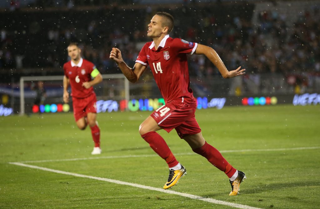 Serbias Mijat Gacinovic celebrates scoring their first goal.