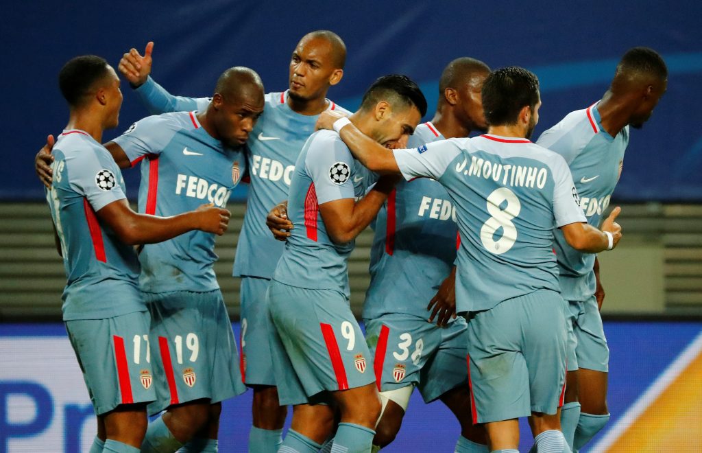 Monaco's Youri Tielemans celebrates scoring their first goal with teammates.