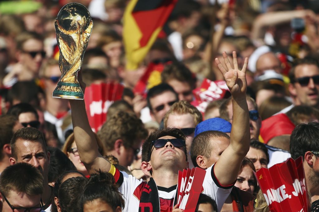 Fans enjoy the atmosphere during celebrations to mark Germany's 2014 Brazil World Cup victory.