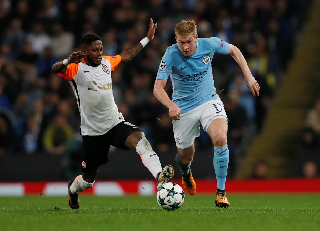 Manchester City's Kevin De Bruyne in action with Shakhtar Donetsk's Fred.