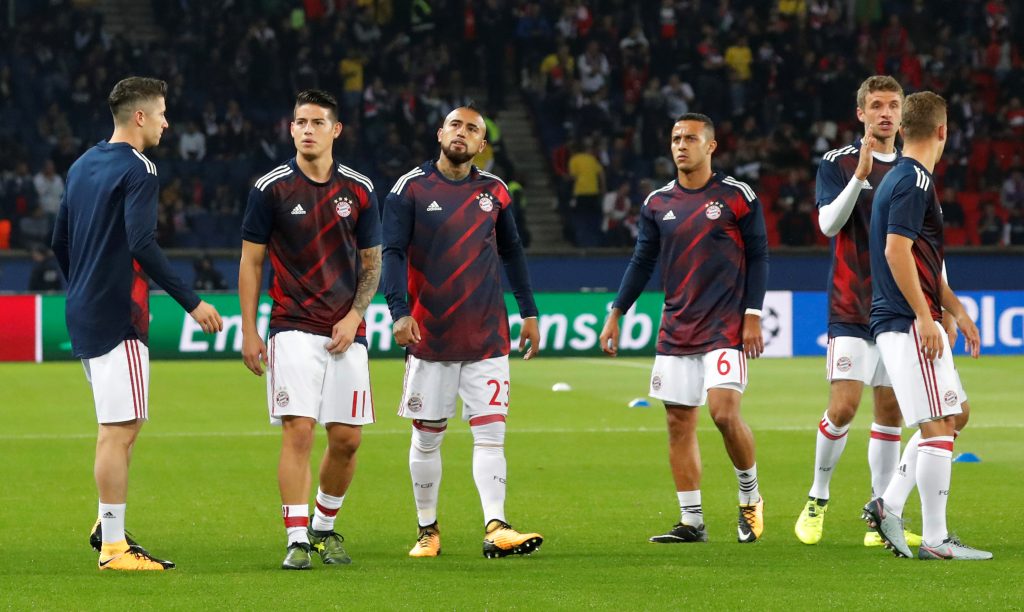 Bayern Munich's James Rodriguez, Thiago Alcantara, Thomas Muller and Arturo Vidal warm up.