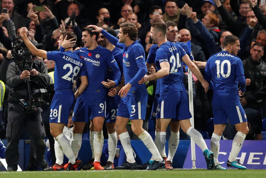 Chelseas Alvaro Morata celebrates scoring their first goal with teammates.