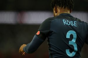 General view of Englands Danny Rose with a black armband with a poppy.