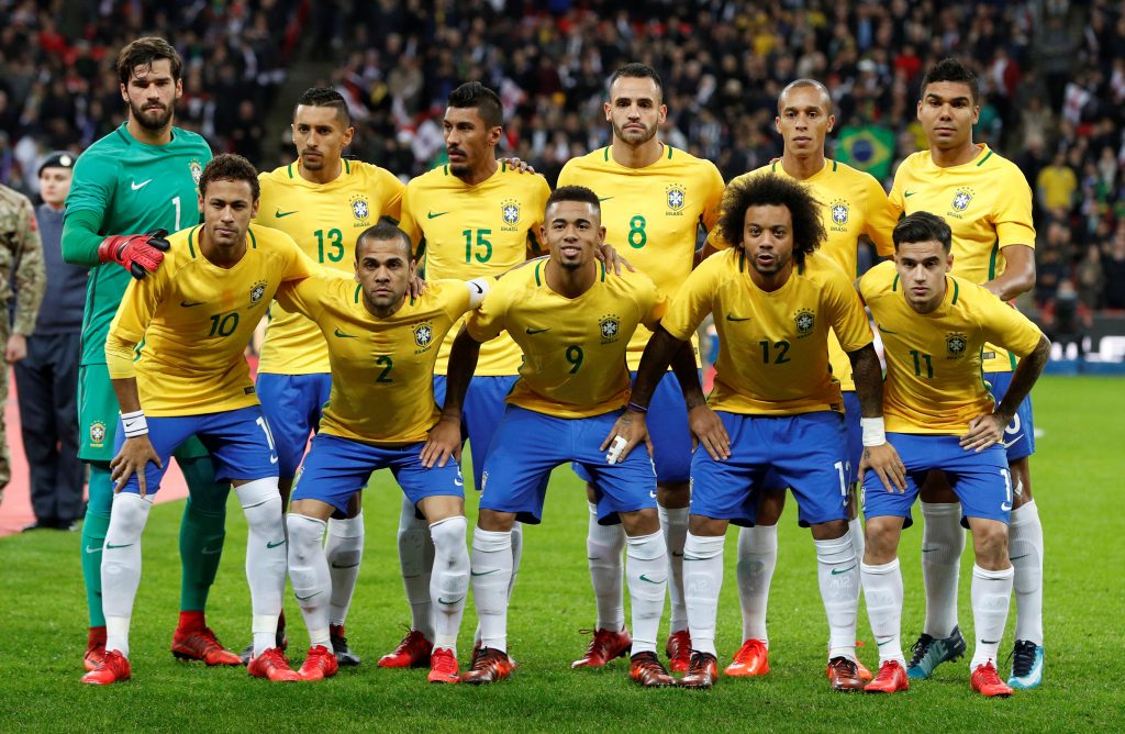 Brazil players pose for a team group photo before the match.