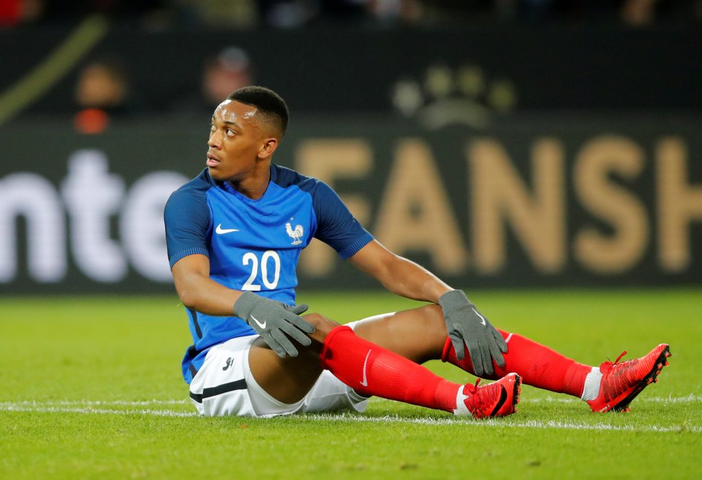 Frances Anthony Martial reacts after going down.
