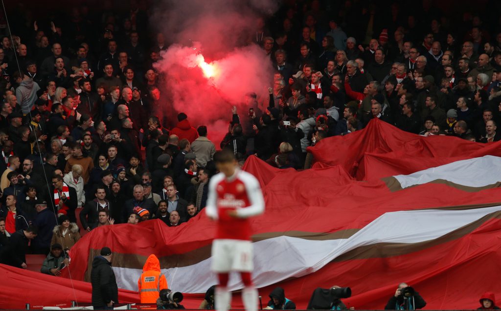 Arsenal fans with a flare.