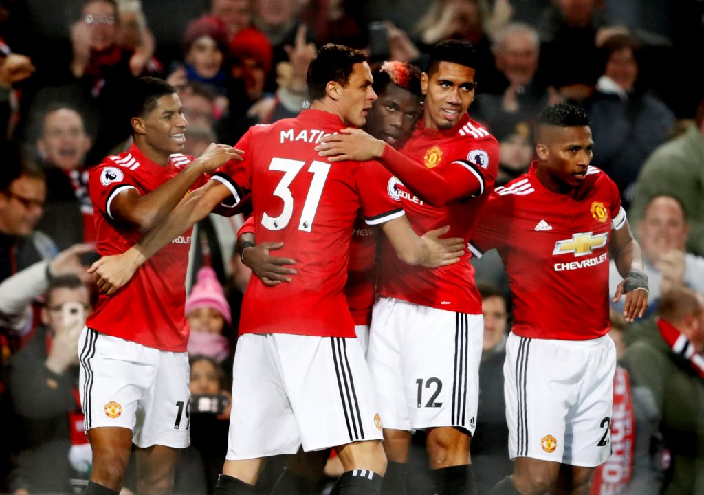 Paul Pogba celebrates with team mates.