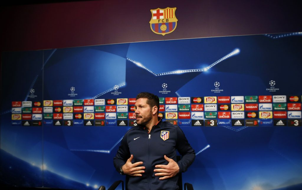 Atletico Madrid's coach Diego Simeone attends a news conference.