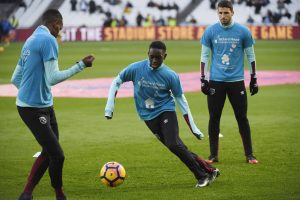 West Ham United's Domingos Quina during the warm up wearing t-shirts in support of Richard House, a childrens hospice and charity.