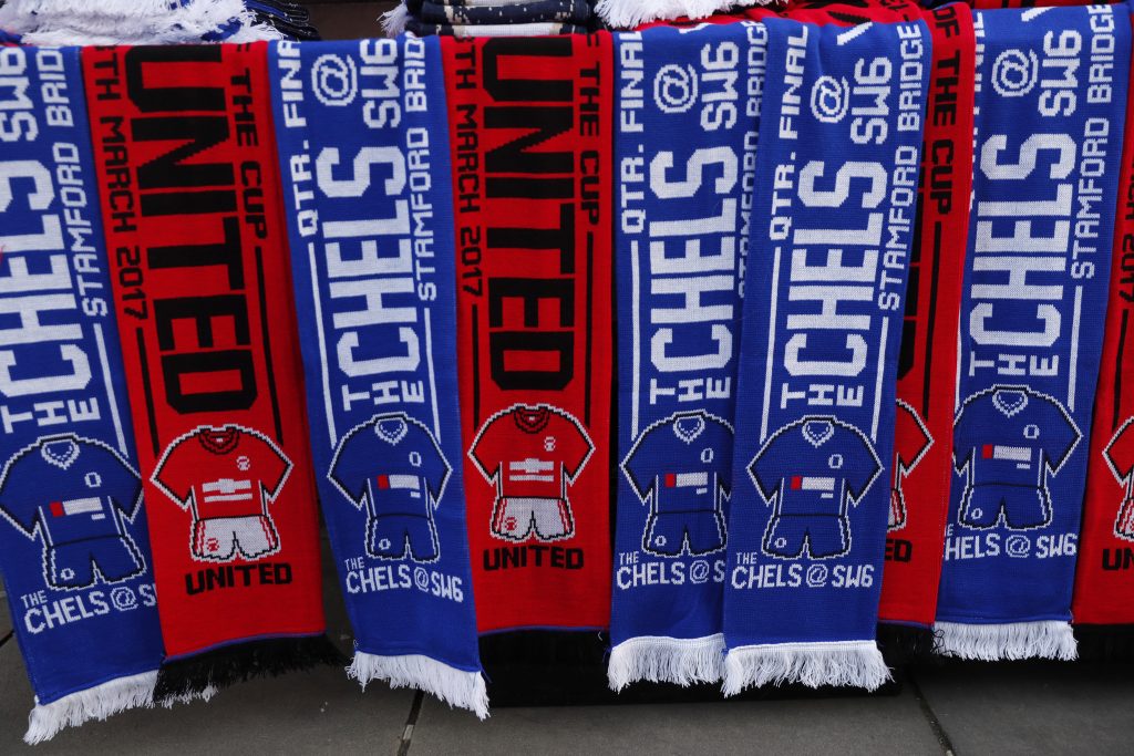 Scarves on sale outside the stadium before the match.