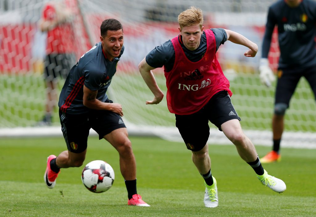 Belgium's players Eden Hazard and Kevin De Bruyne attend a training session.
