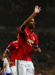 Marcus Rashford celebrates scoring.