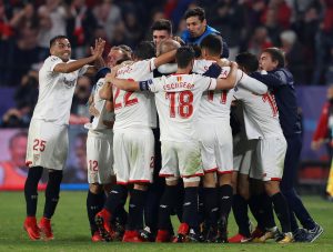 Sevillas Guido Pizarro celebrates scoring their third goal with Sergio Escudero, Gabriel Mercado and team mates.