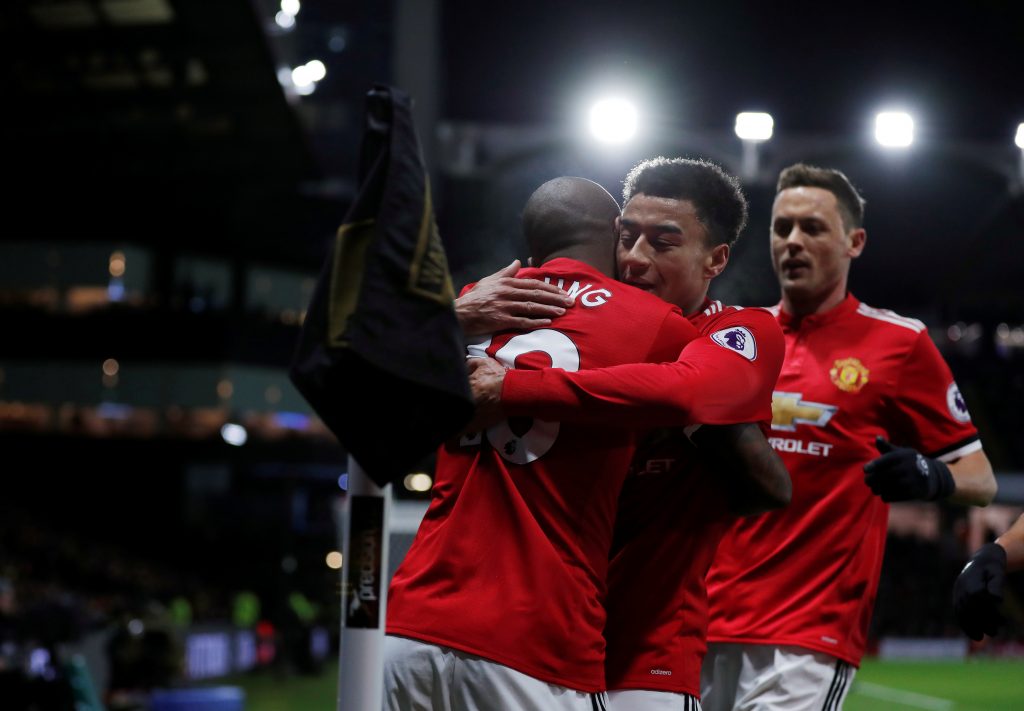Ashley Young celebrates scoring goal with Jesse Lingard.