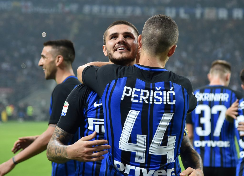 Inter Milan's Mauro Icardi celebrates scoring their first goal with Ivan Perisic.