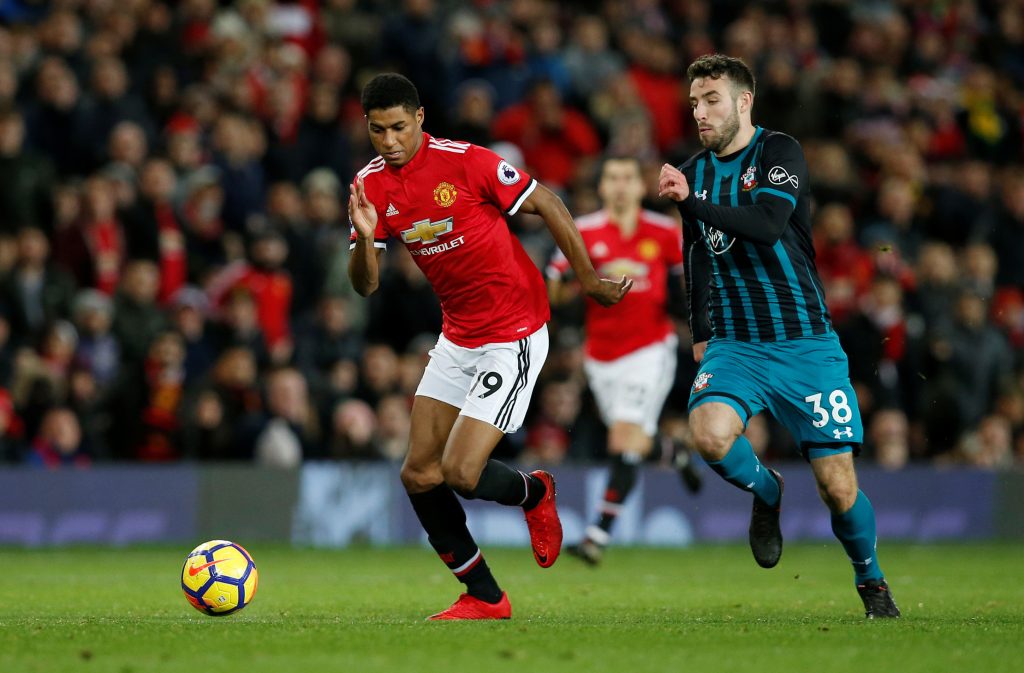 Manchester United's Marcus Rashford in action with Southampton's Sam McQueen.