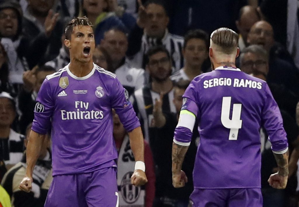 Cristiano Ronaldo celebrates scoring with Sergio Ramos.