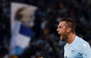 Lazios Stefan de Vrij celebrates scoring their first goal.