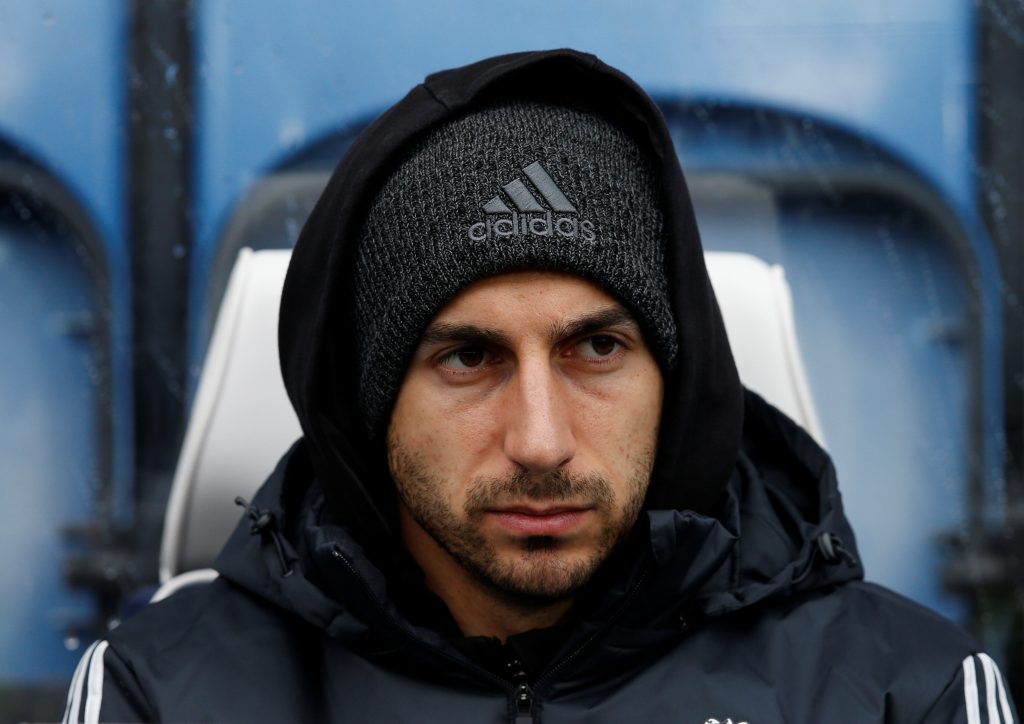 Henrikh Mkhitaryan sat on the bench before the match.