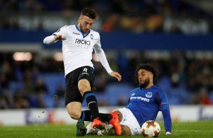 Everton's Ashley Williams fouls Atalanta's Bryan Cristante for a penalty.