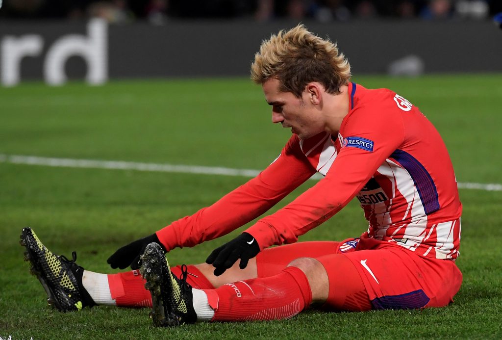 Atletico Madrids Antoine Griezmann looks dejected.