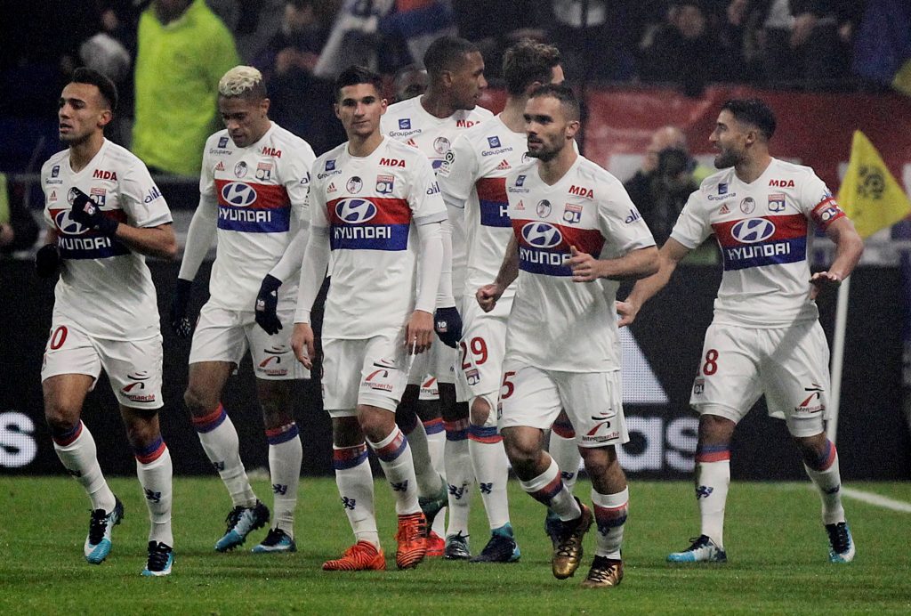 Lyon's Nabil Fekir celebrates scoring their first goal with team mates.