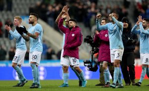 Sergio Aguero celebrates with Fernandinho, Nicolas Otamendi, Kevin De Bruyne.