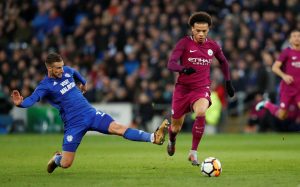 Man City's Leroy Sane is fouled by Cardiff City's Joe Bennett.