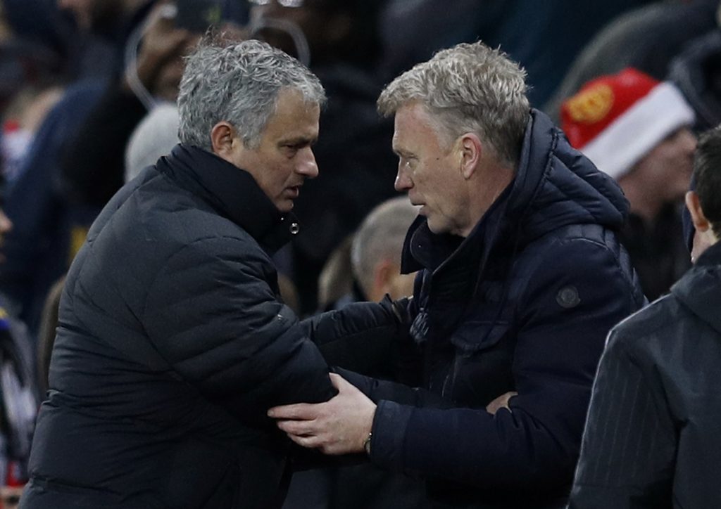 Jose Mourinho and David Moyes shake hands after the game.