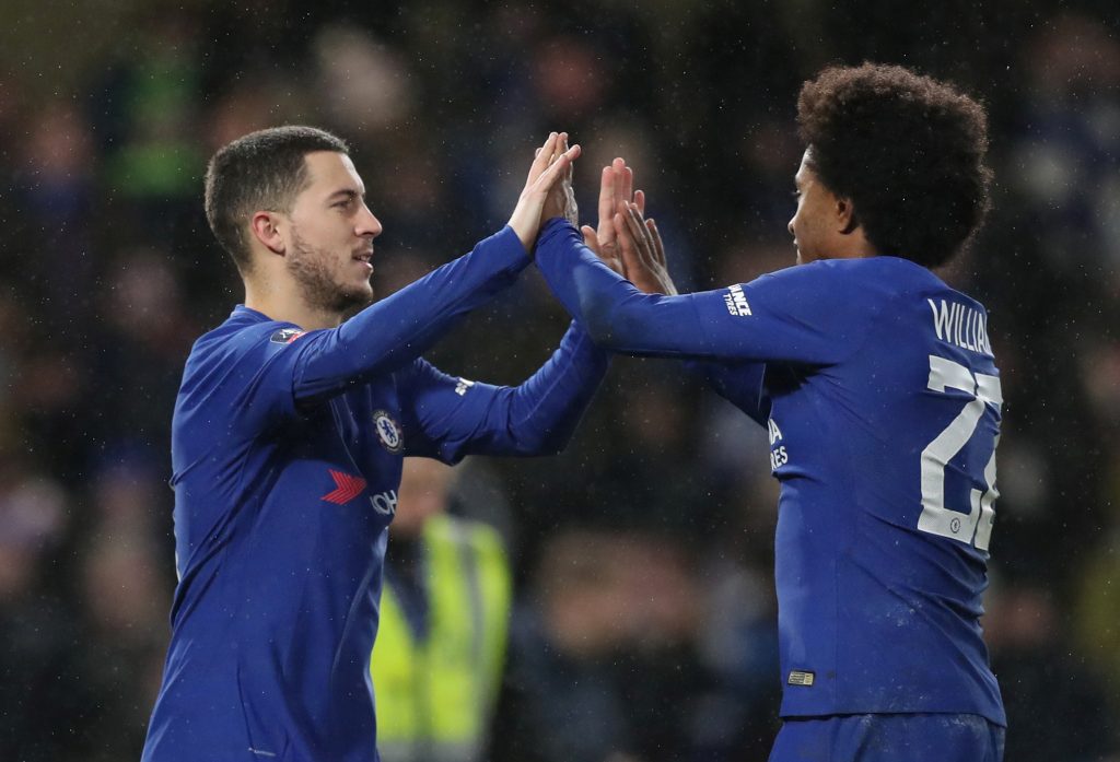 Chelsea's Eden Hazard celebrates with Willian after winning the penalty shoot out.