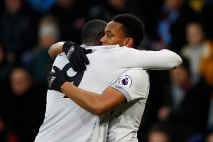 Manchester United's Anthony Martial celebrates scoring their first goal with Romelu Lukaku.