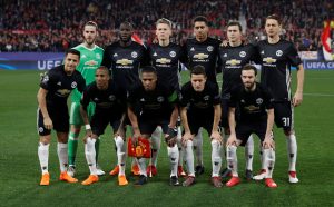 Manchester United players pose for a team group photo before the match.
