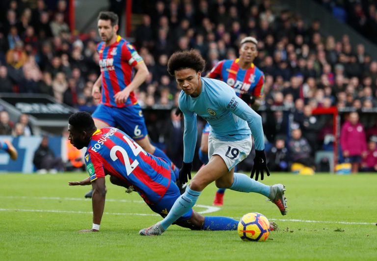 Crystal Palaces Timothy Fosu-Mensah in action with Manchester City's Leroy Sane.