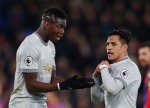 Manchester United's Paul Pogba and Alexis Sanchez.