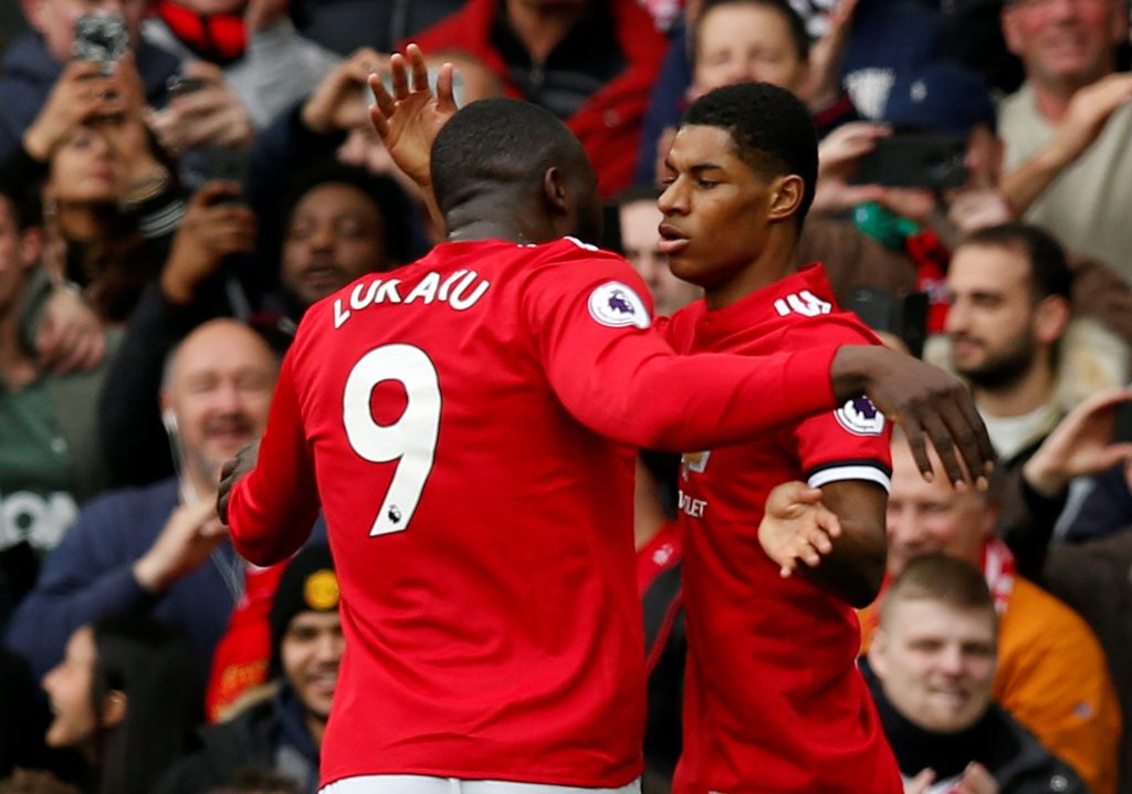 Manchester United's Marcus Rashford celebrates scoring their first goal with Romelu Lukaku.
