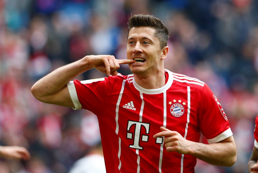 Bayern Munich's Robert Lewandowski celebrates scoring their third goal.