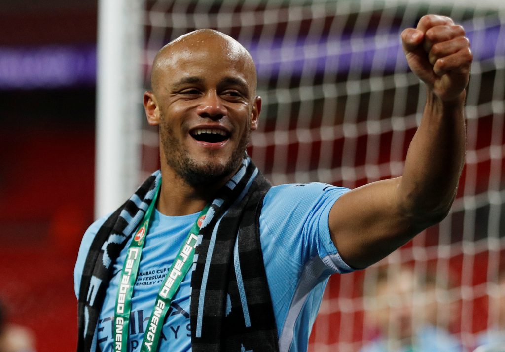 Man Citys Vincent Kompany celebrates winning the Carabao Cup.