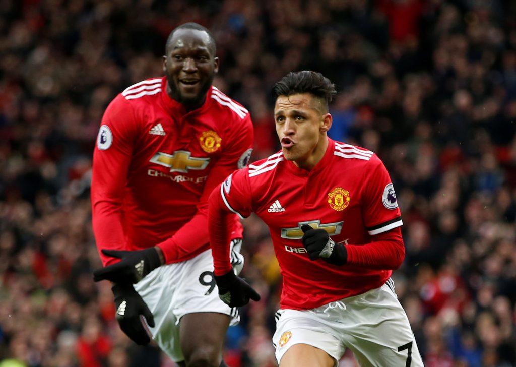 Manchester United's Alexis Sanchez celebrates scoring their second goal with Romelu Lukaku.