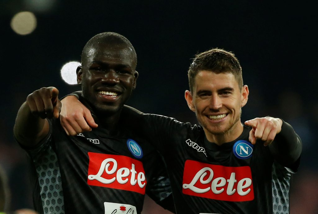 Napoli's Kalidou Koulibaly and Jorginho (R) celebrate after the match.